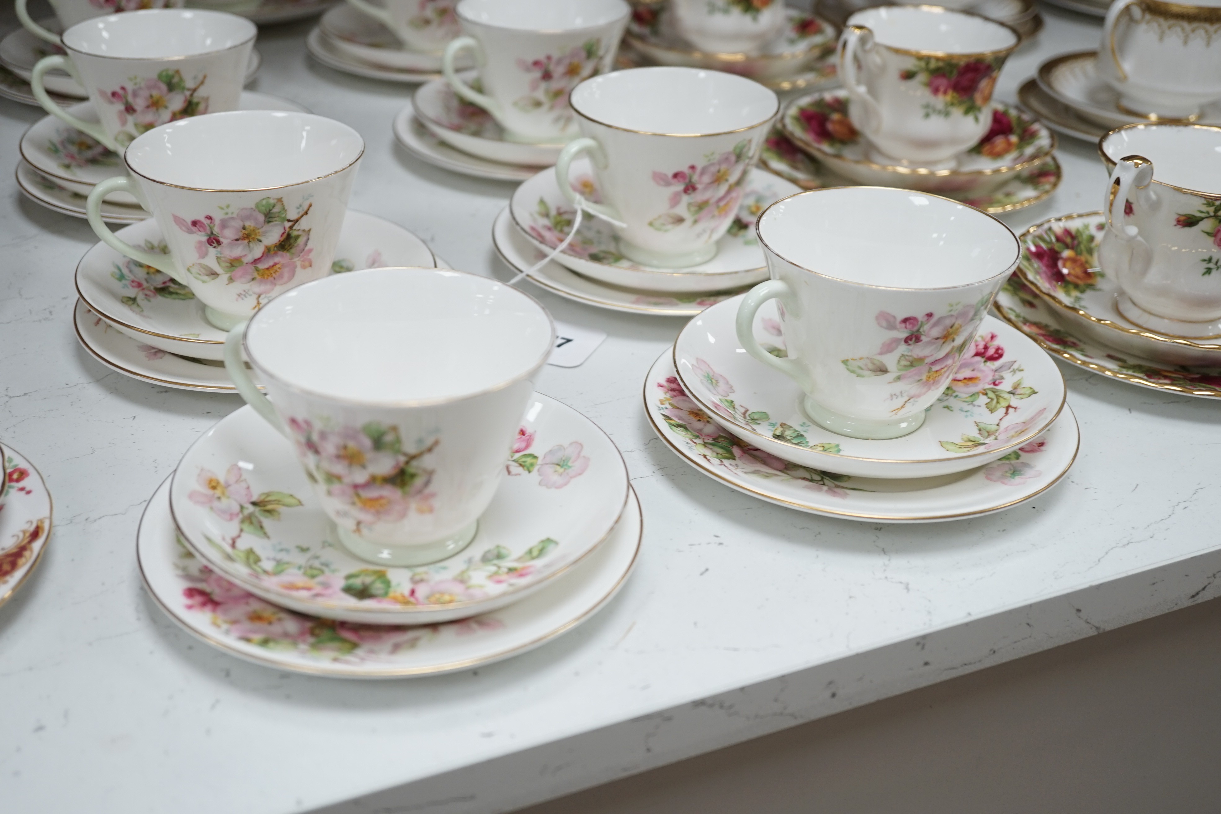 Four sets and part sets of bone china tableware, to include Royal Doulton Apple Blossom H4899, Royal Albert Old Country Roses, Paragon Athena, Tuscan Windsor, and Royal Vale D669. Approx 84 pieces